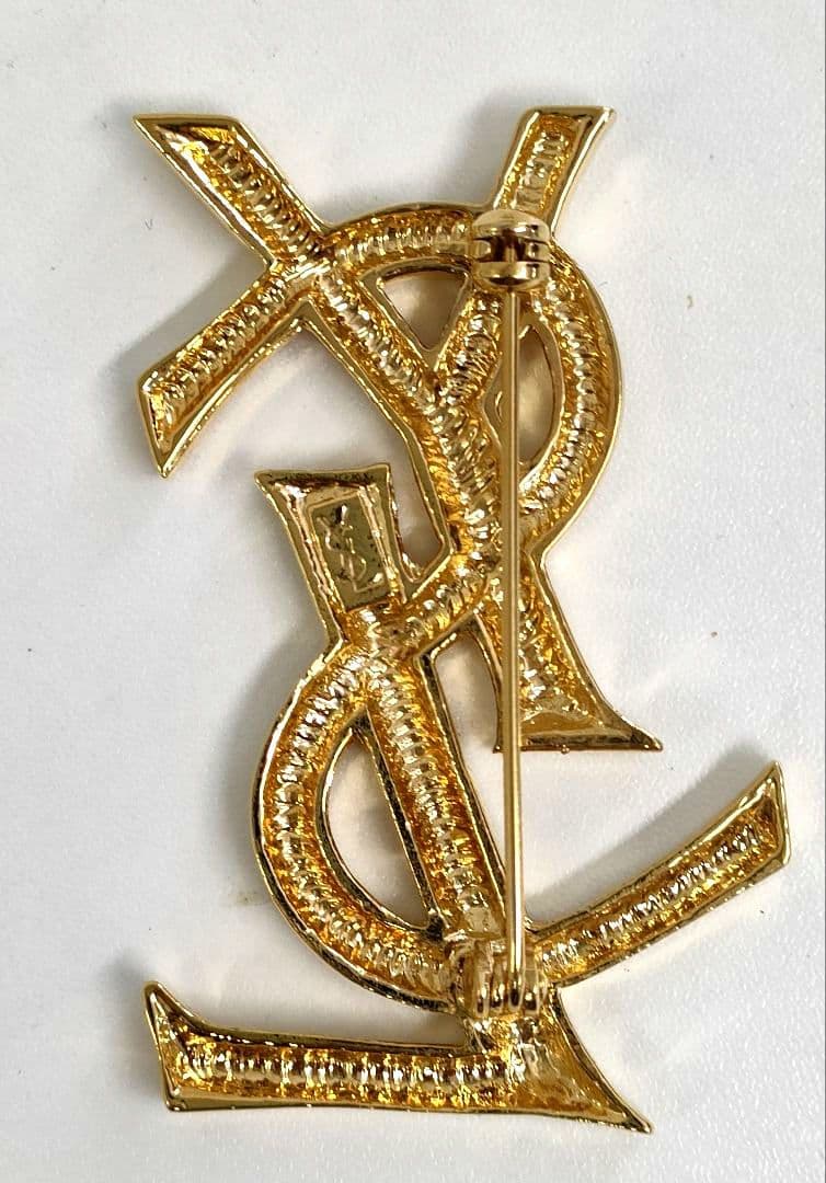 AMH12 イヴサンローラン 美品 カサンドラ YSLロゴブローチ