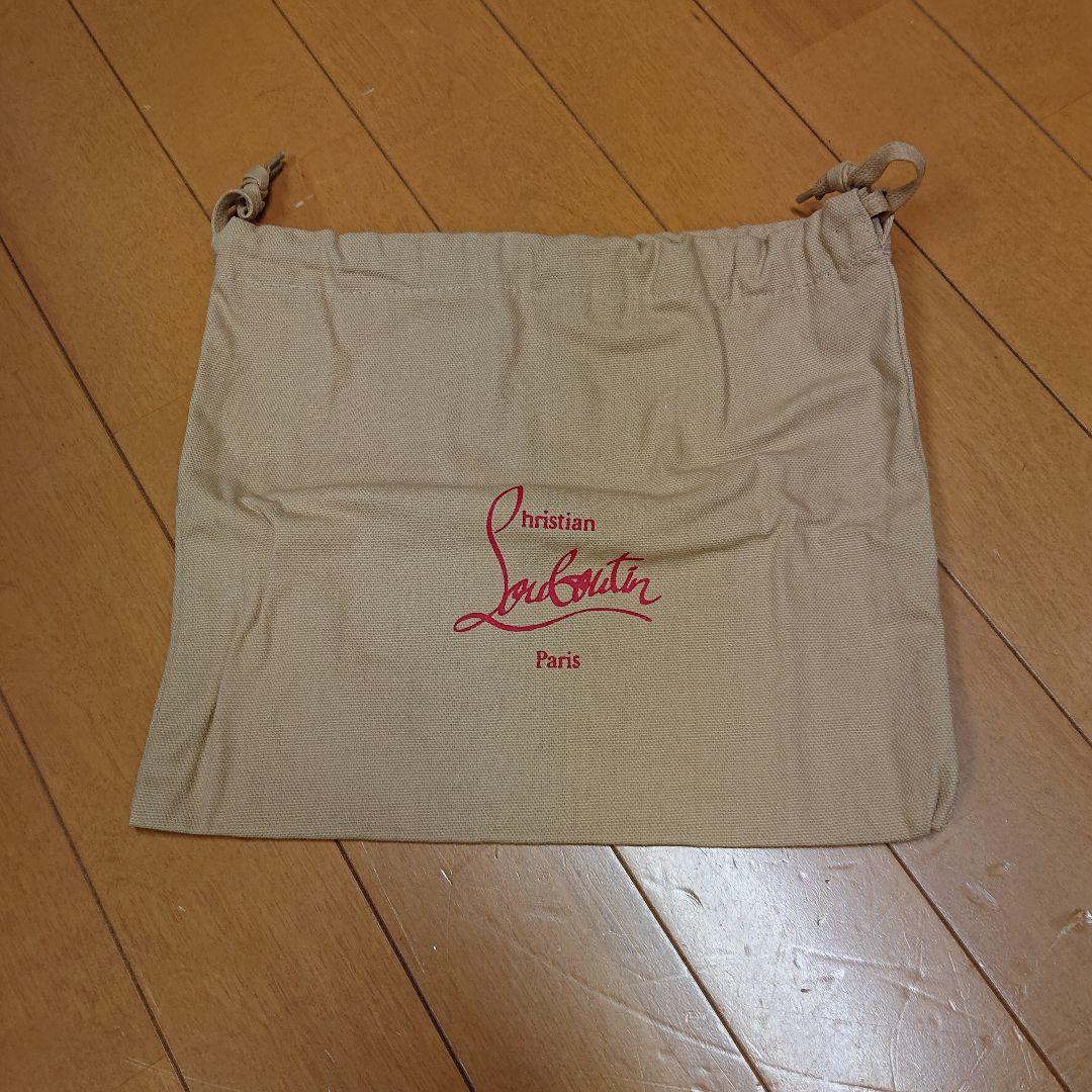 現行モデル クリスチャンルブタン パネトーネ スタッズ ラウンド 長財布