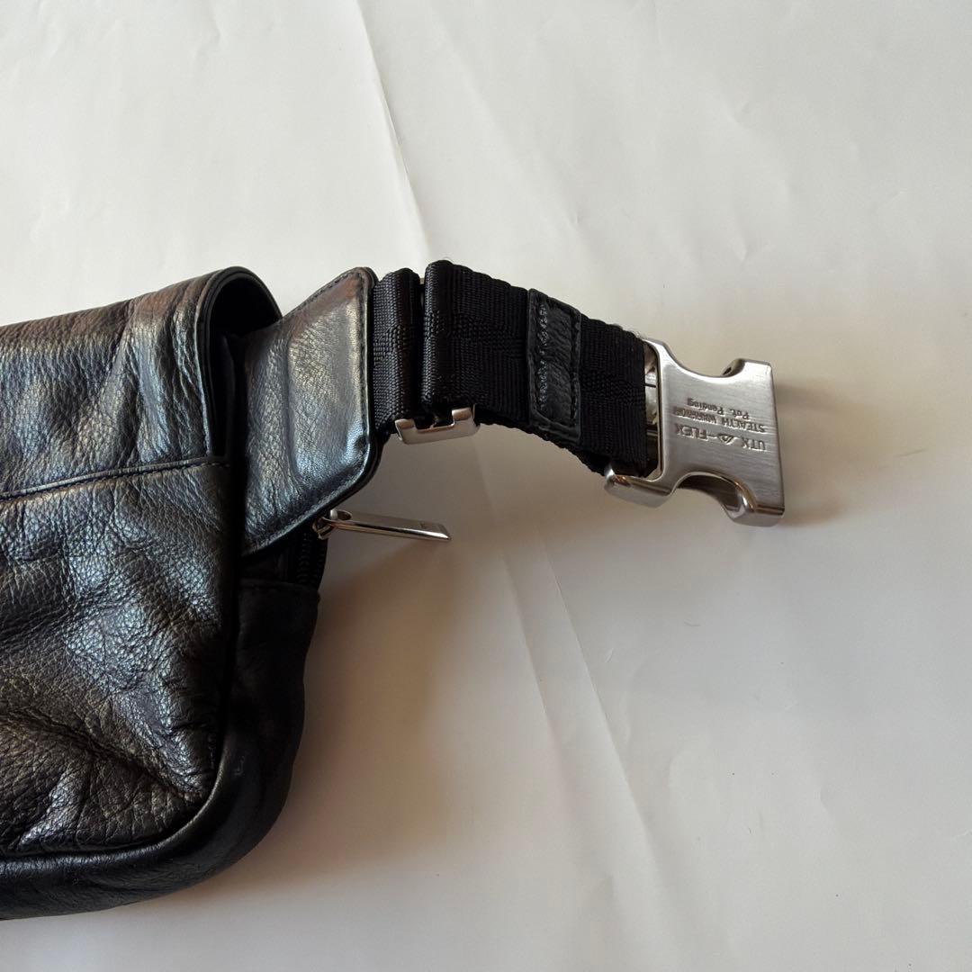 u*l様 TUMI/・トゥミイ黒 レザー ボディバッグ ウエストポーチフラップ付