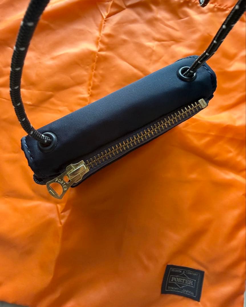 バッグ PORTER EXCHANGE PX TANKER SLING PURSE