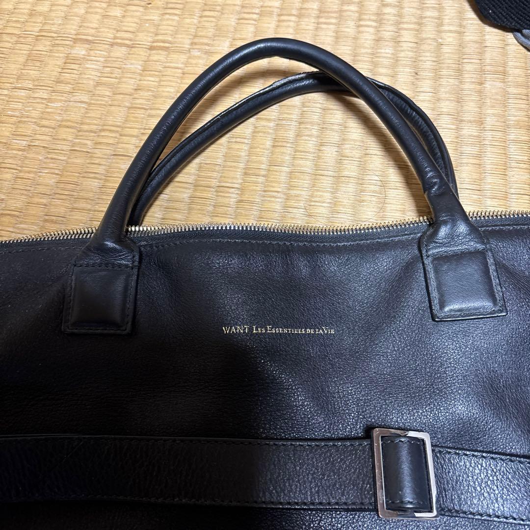 ウォントレスエッセンシャルデラヴイ　 ブラックレザートート トゥモローランド