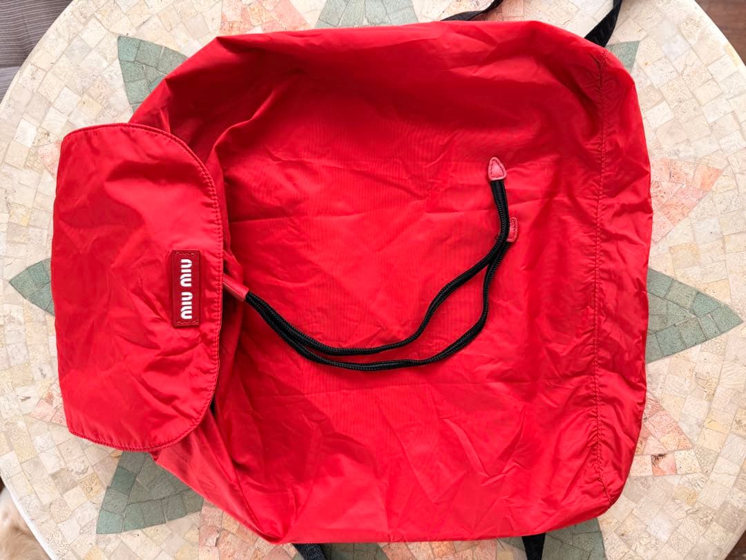 MIU MIU レッドバックパック