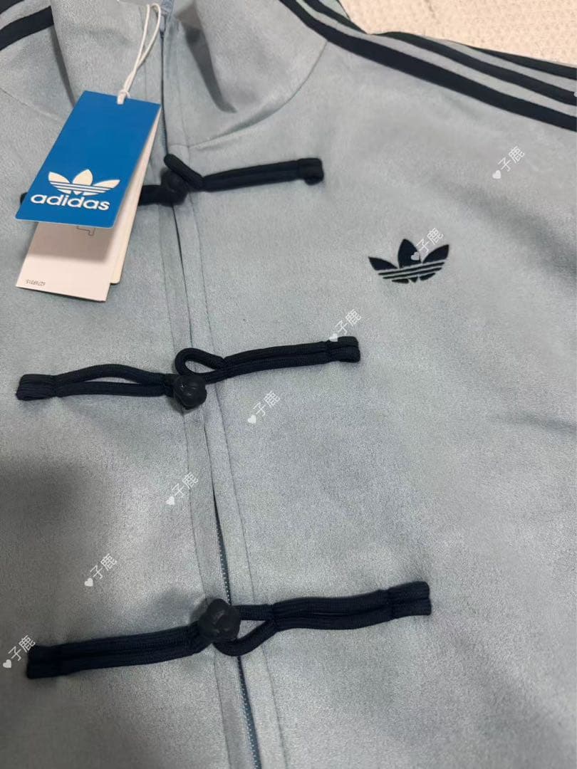 adidasアディダス 中国限定 蛇年トラックジャケットダー みずいろ M