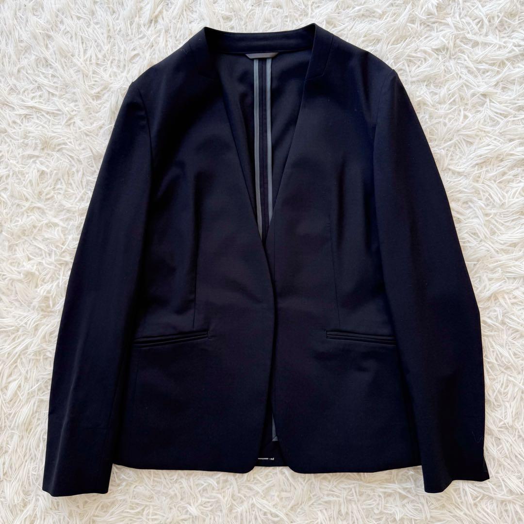 グリーンレーベルリラクシング セットアップスーツ ノーカラー 手洗可 ネイビー