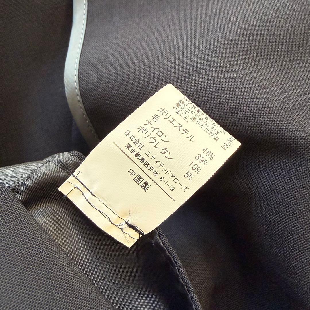 グリーンレーベルリラクシング セットアップスーツ ノーカラー 手洗可 ネイビー