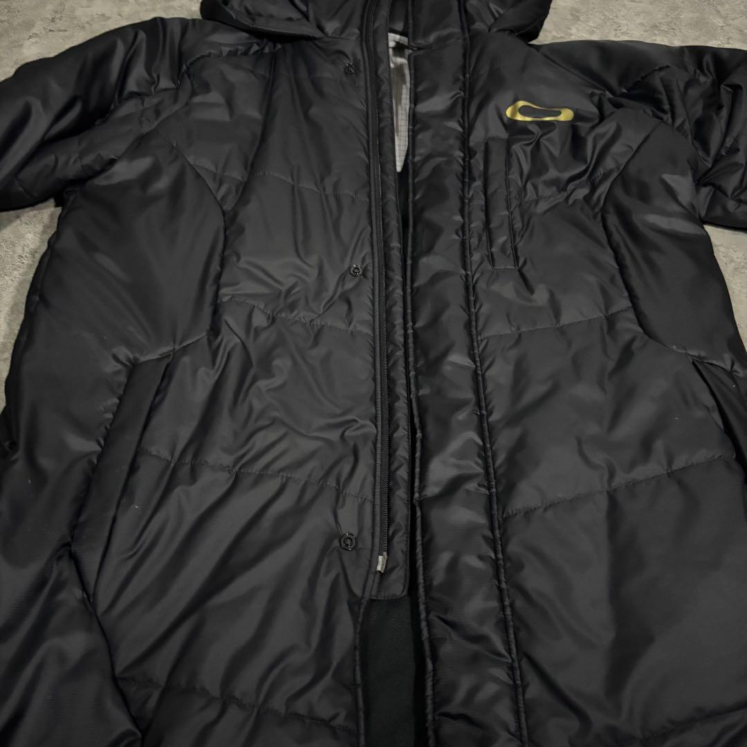 美品OAKLEY オークリー ベンチコート XL ロングコート フード付 ロゴ