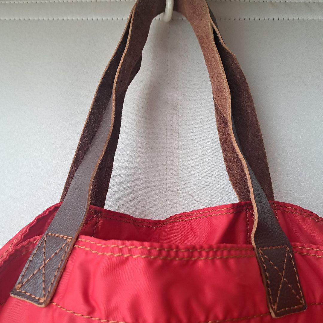 j*5様 tricot COMME des GARCONS 赤いナイロンバッグ