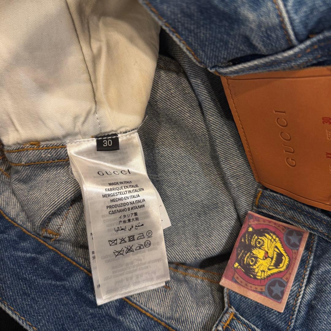 GUCCI NYロゴ刺繍デニムパンツ