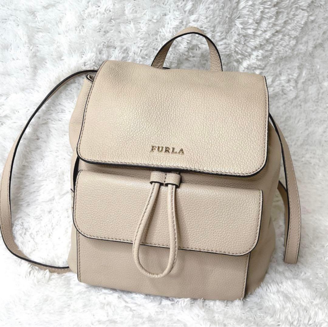 未使用級✨フルラ ミニリュック レザー ロゴ 巾着型 袋付き ベージュ