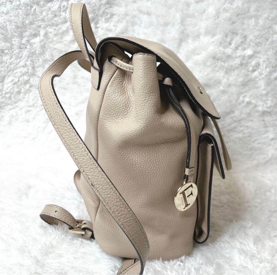 未使用級✨フルラ ミニリュック レザー ロゴ 巾着型 袋付き ベージュ