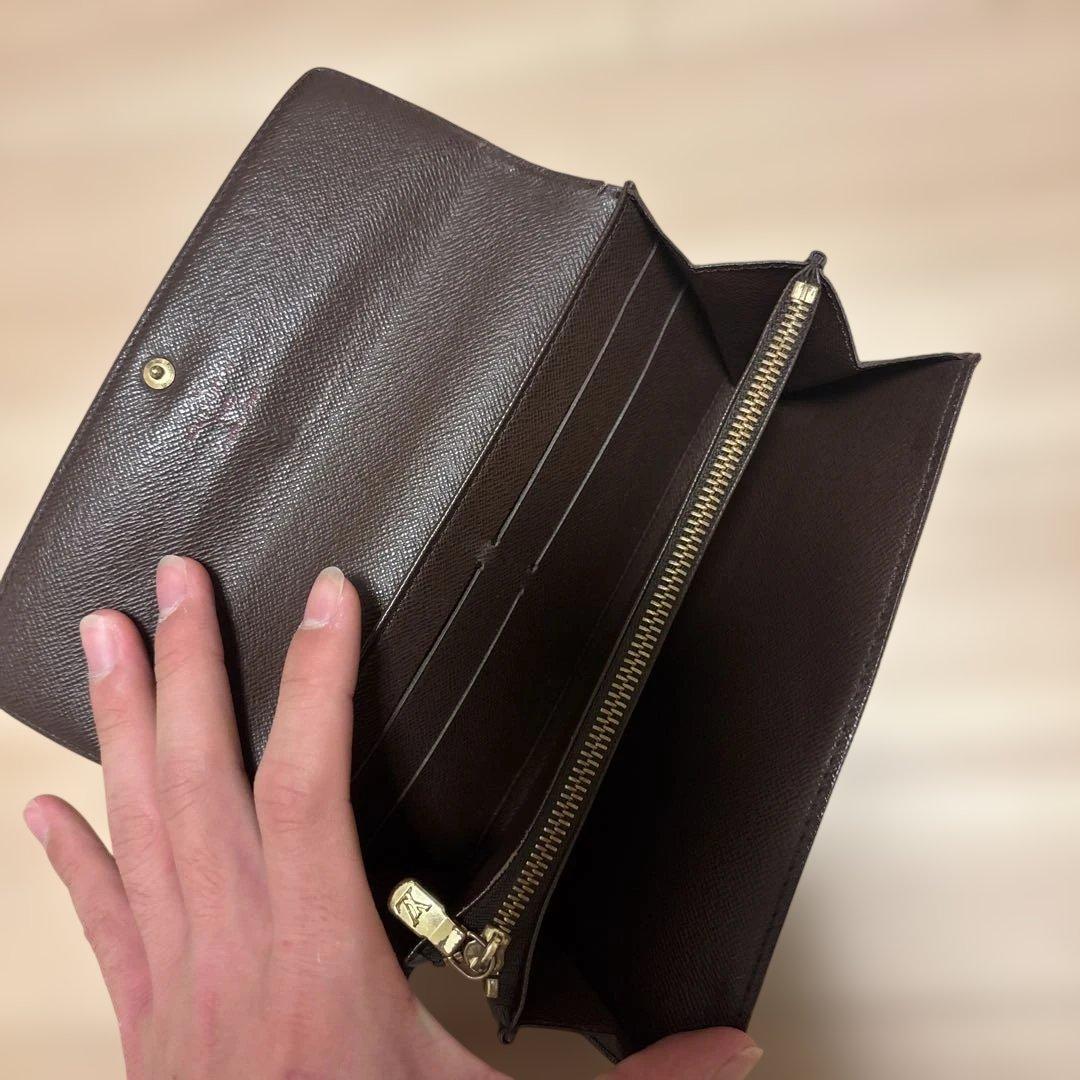 ルイ・ヴィトンのダミエ柄長財布 ダークブラウン