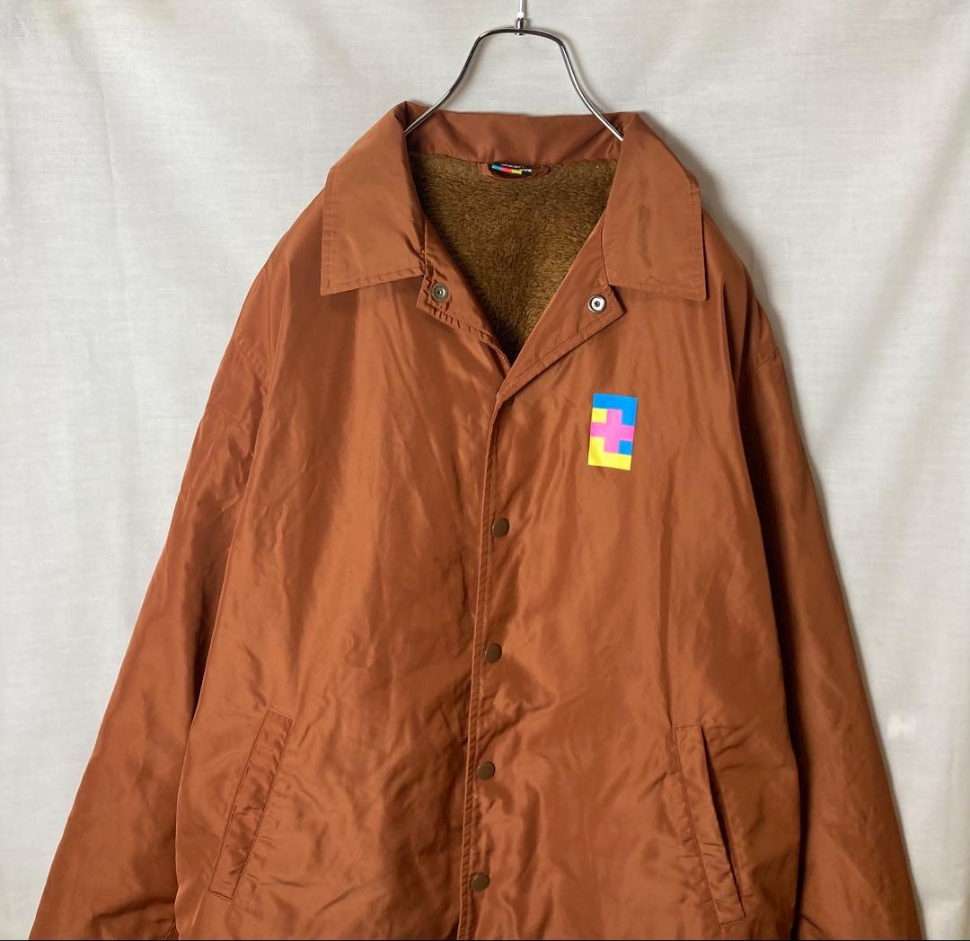 XLARGEギャルヒップビッグプリントくすみオレンジ裏ボアコーチジャケットL