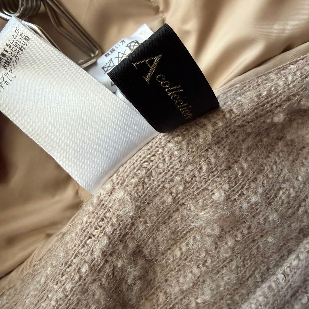 ダーマコレクシン　背中ダウンジャケット？カーディガン　ベージュカラー