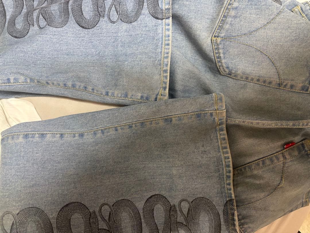 snake loop フレアデニムパンツ