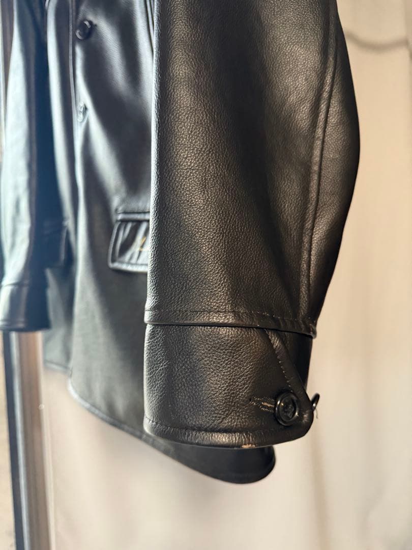 UNCHANGING LOVE [アンチェンジングラブ]レザーカーコート XL