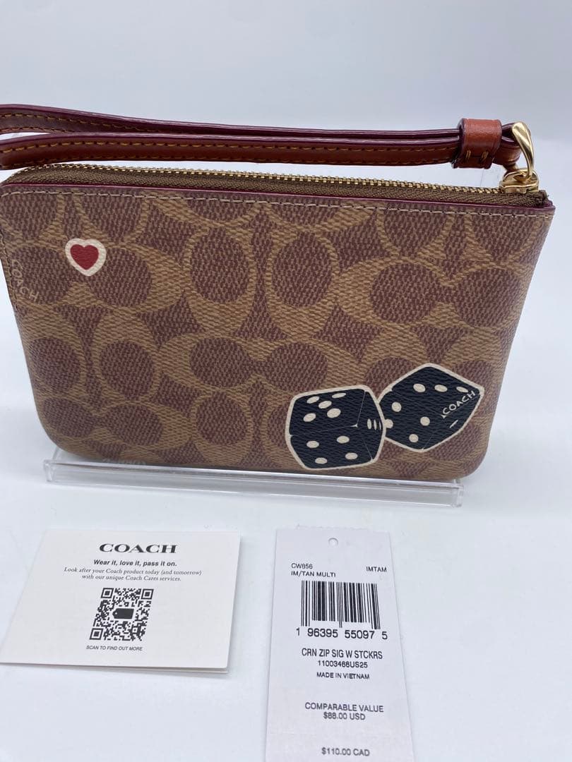 【COACH/CW856】ポーチ ステッカープリント恐竜 いちごダイスダイナソー
