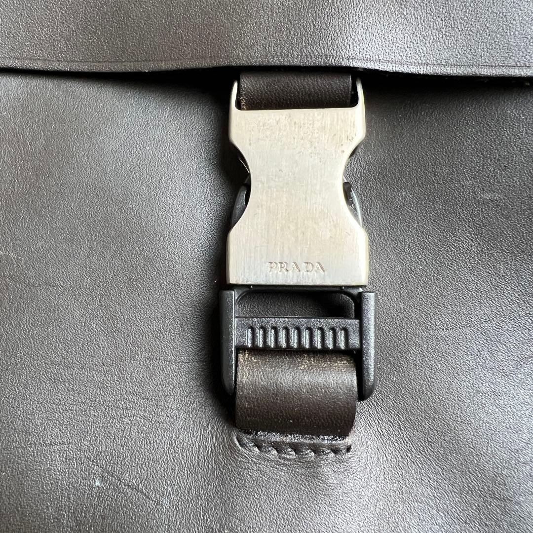バッグ PRADA leather messenger bag dark brown