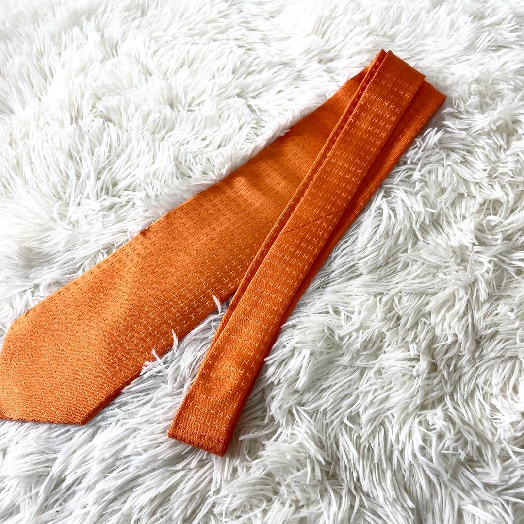 エルメス　HERMES ネクタイ　H柄　オレンジ　橙色　メンズ　ビジネス　通勤