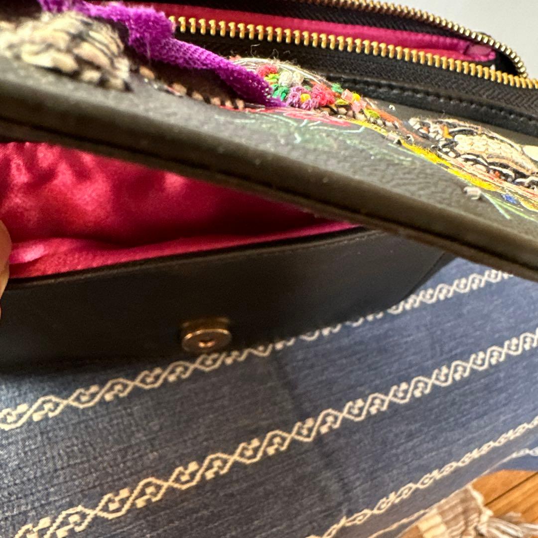 tamaoworldの猫の刺繍レザーポーチ