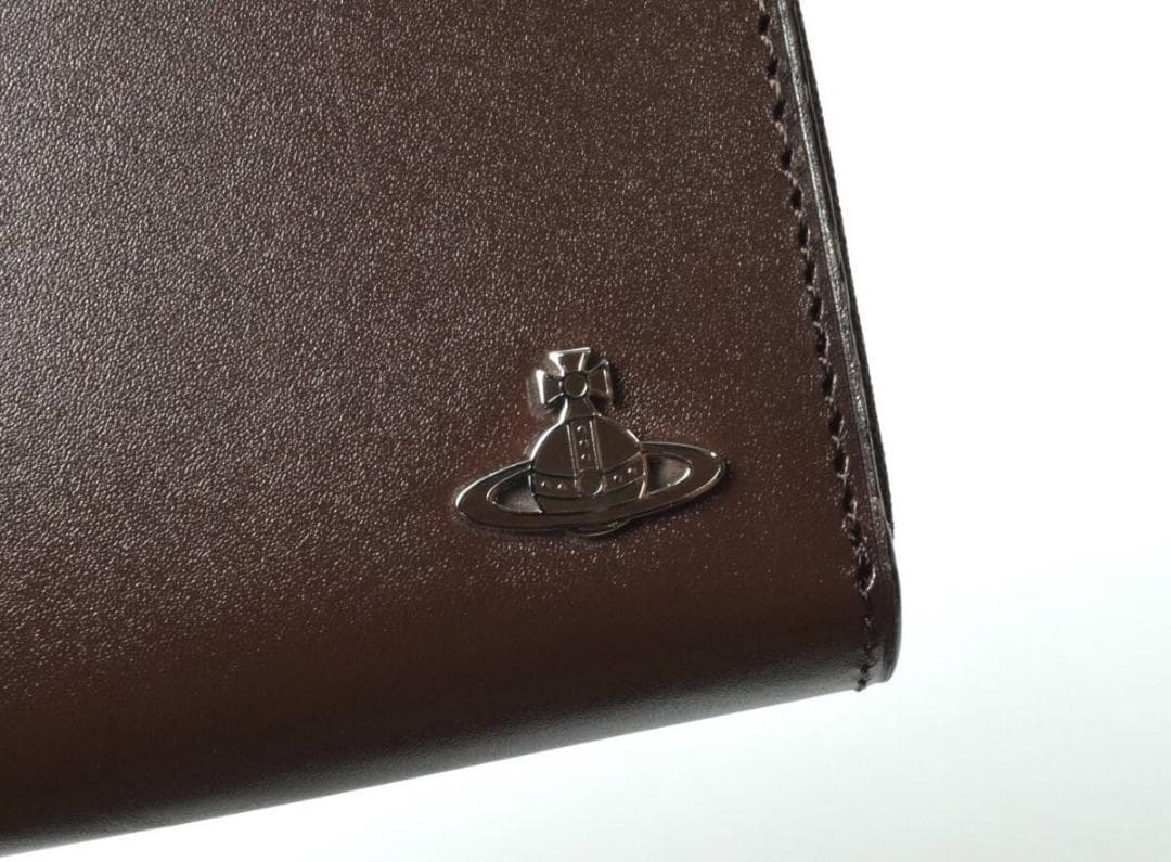 未使用 ヴィヴィアンウエストウッド 牛革ラウンド 長財布 ブラウン VWK829