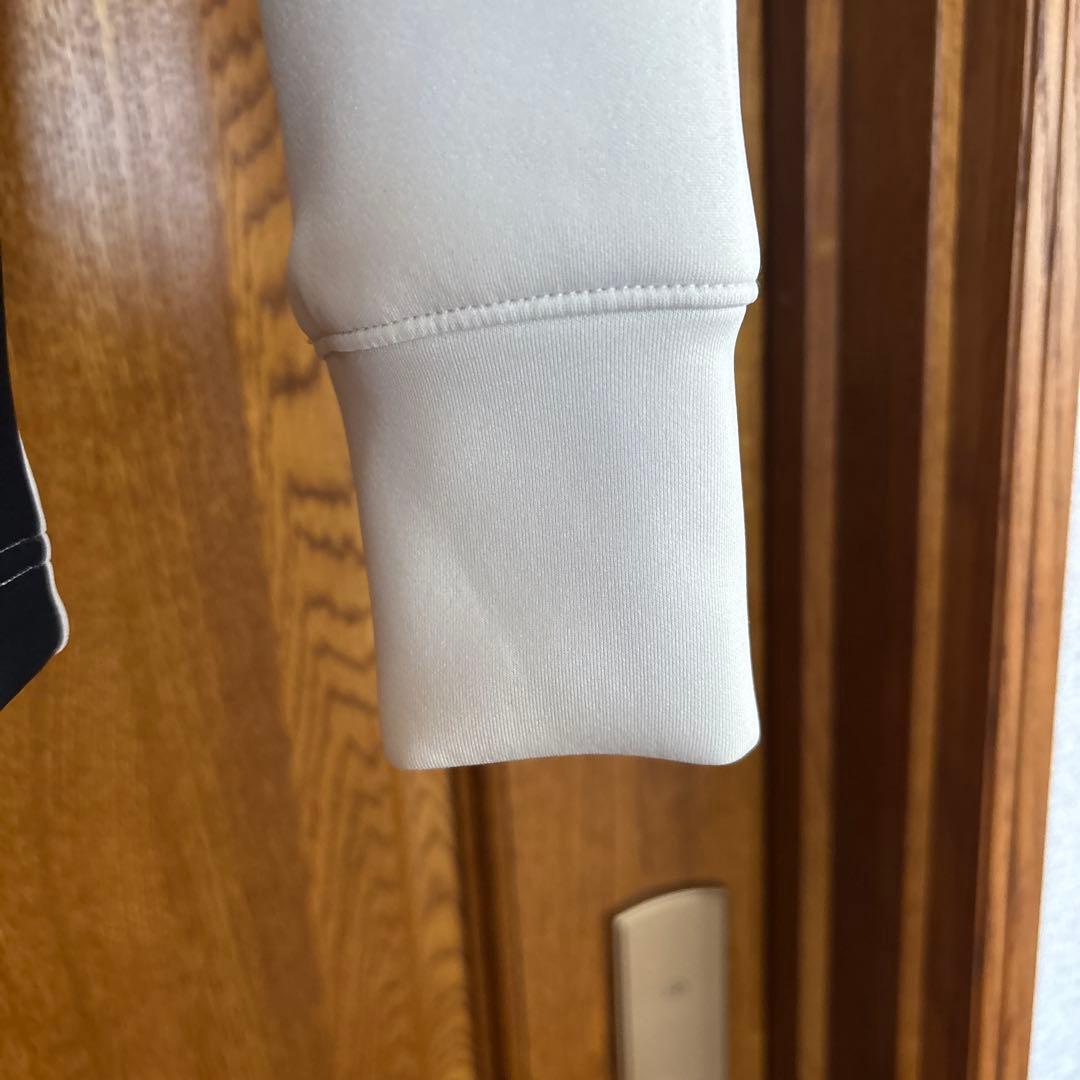 年末年始セール上下M UNDER ARMOUR ジャケット ホワイト・ブラック