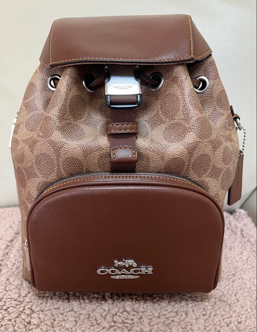 COACH ロゴ入りブラウンレザーバックパック