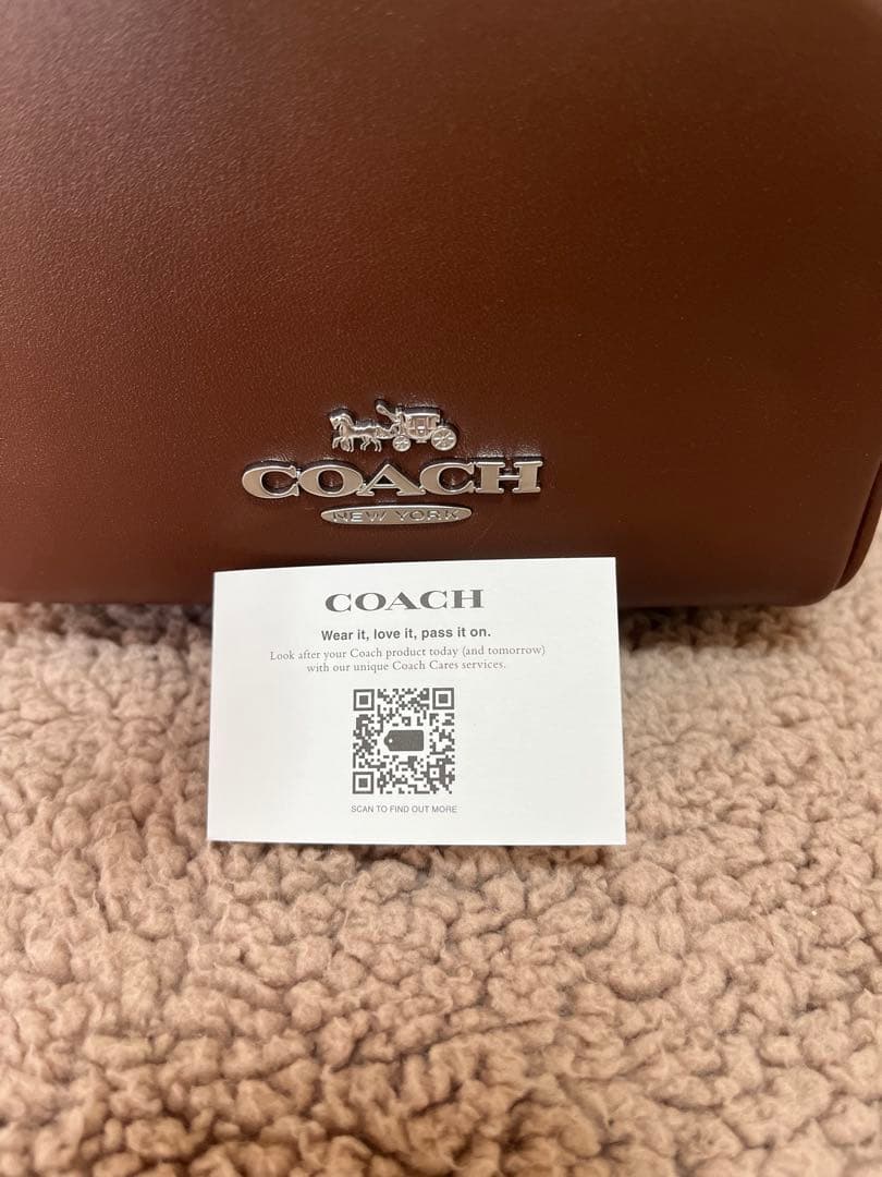 COACH ロゴ入りブラウンレザーバックパック