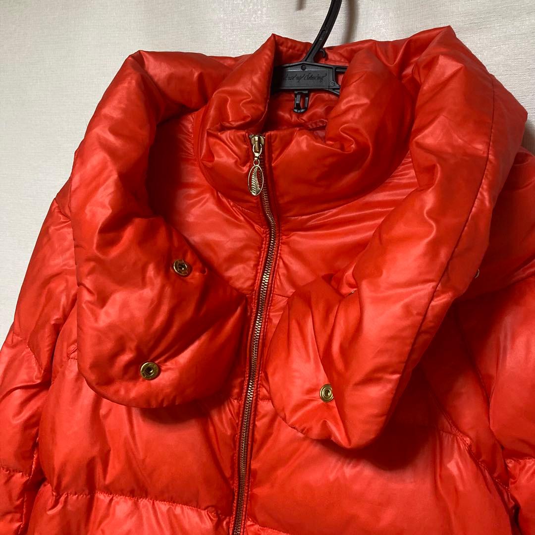 100%ダウン　100%毛皮　大きめボタンが可愛いオレンジのダウンジャケット