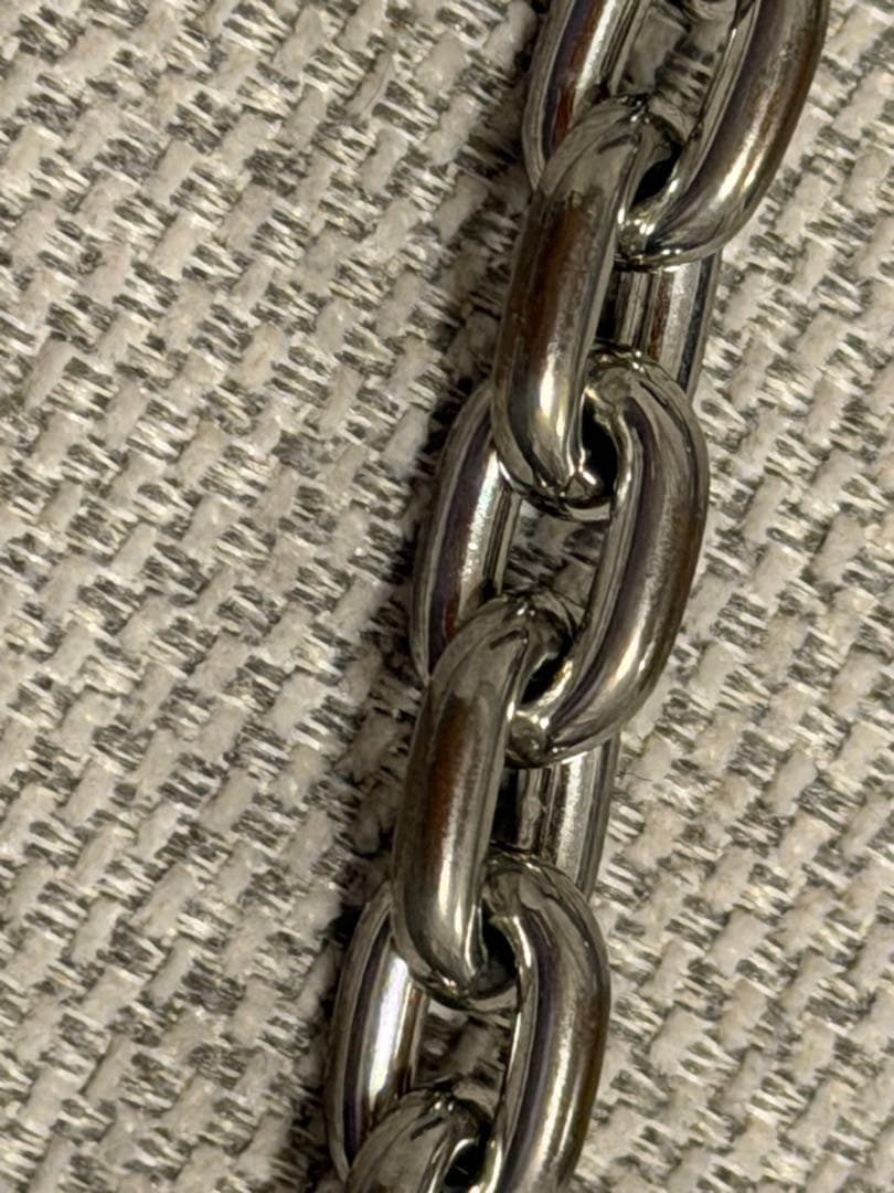 PRADA 三角ロゴプレート ヘアピン