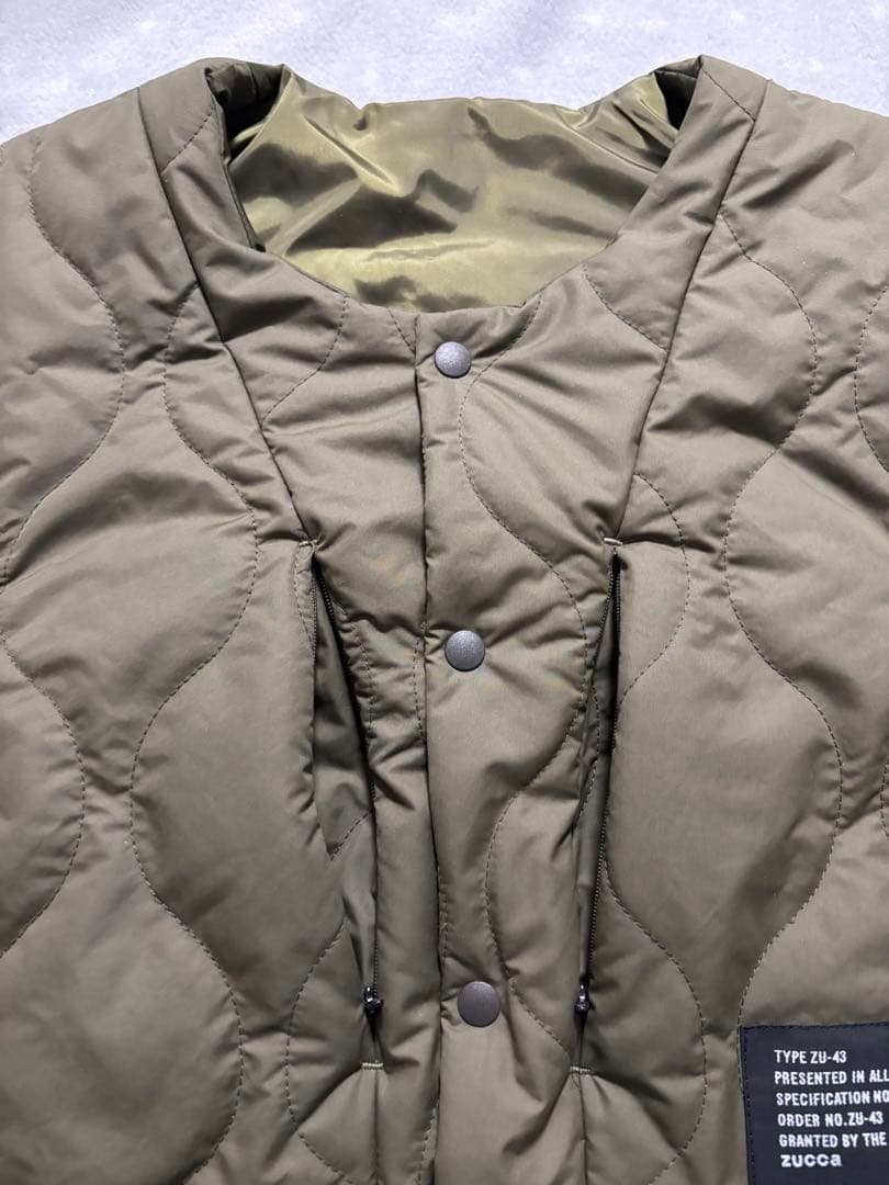 zuccaズッカオリーブ色 キルティングベスト