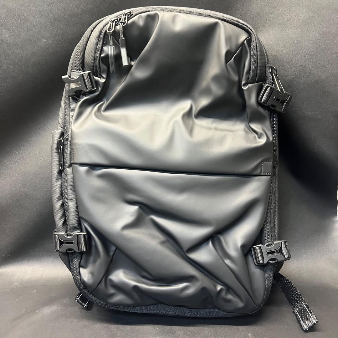 〇Of65 未使用 真空圧縮 バックパック トラベルバッグ ブラック