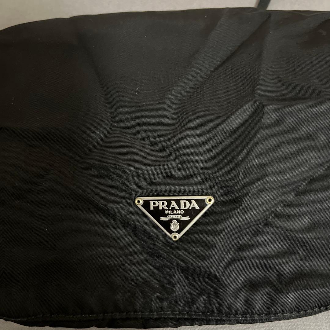 プラダ 巾着　ポーチ バニティ 三角ロゴ 刻印あり