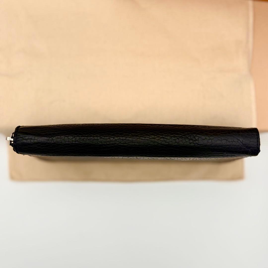 ルイヴィトン　トリヨン　ヴェルティカル　ジッピーウォレット　長財布　M58412