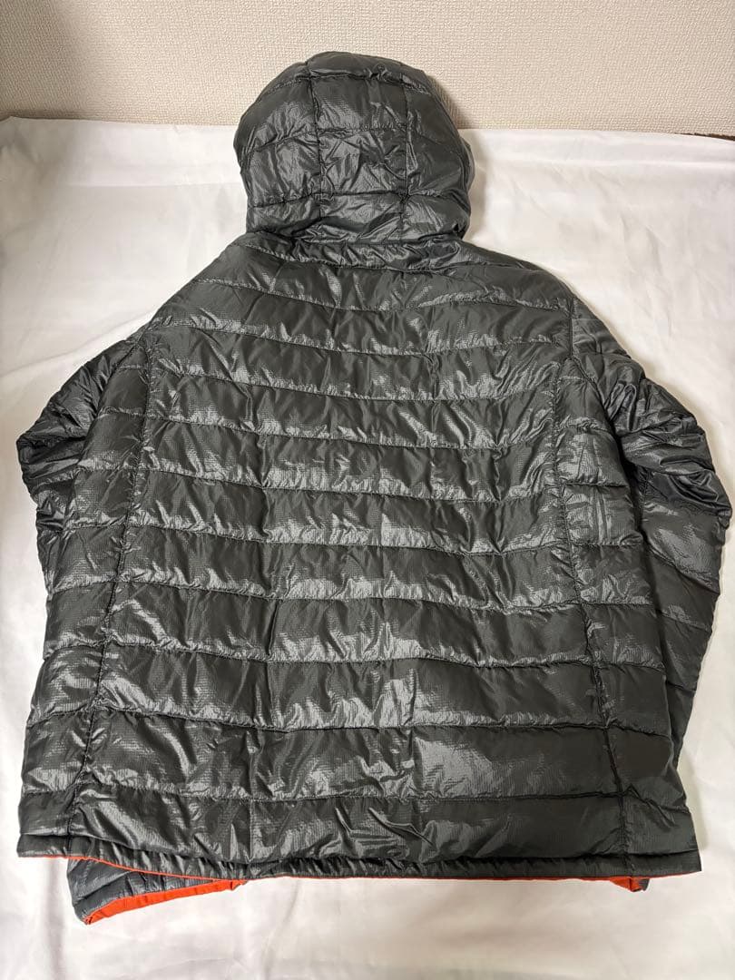 人気モンベル725FP コロラドパーカ　メンズLリバーシブルダウンオレンジグレー