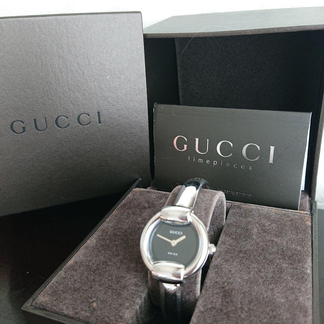 GUCCI timepieces バングルウォッチ黒文字盤 ラウンド 1400L