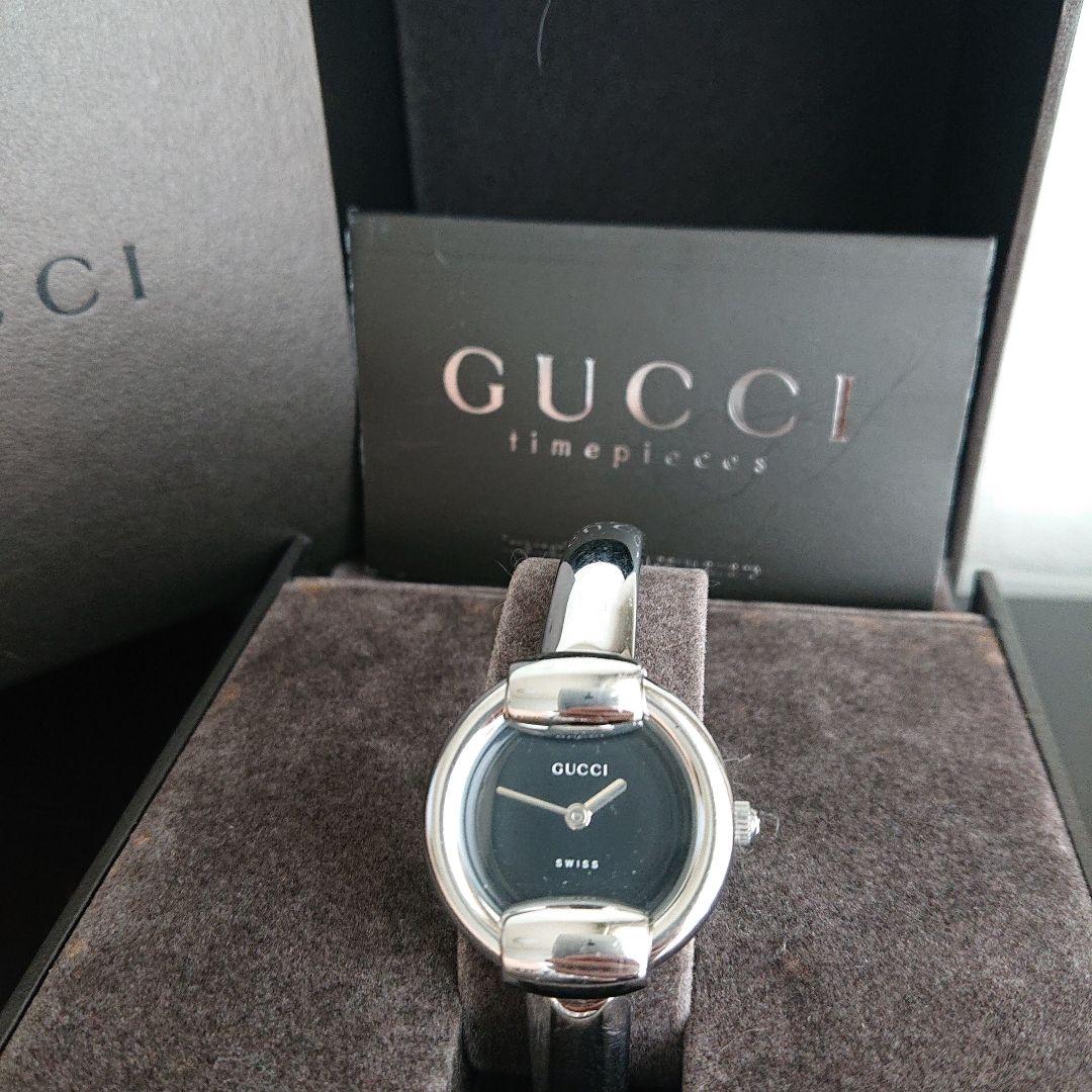 GUCCI timepieces バングルウォッチ黒文字盤 ラウンド 1400L