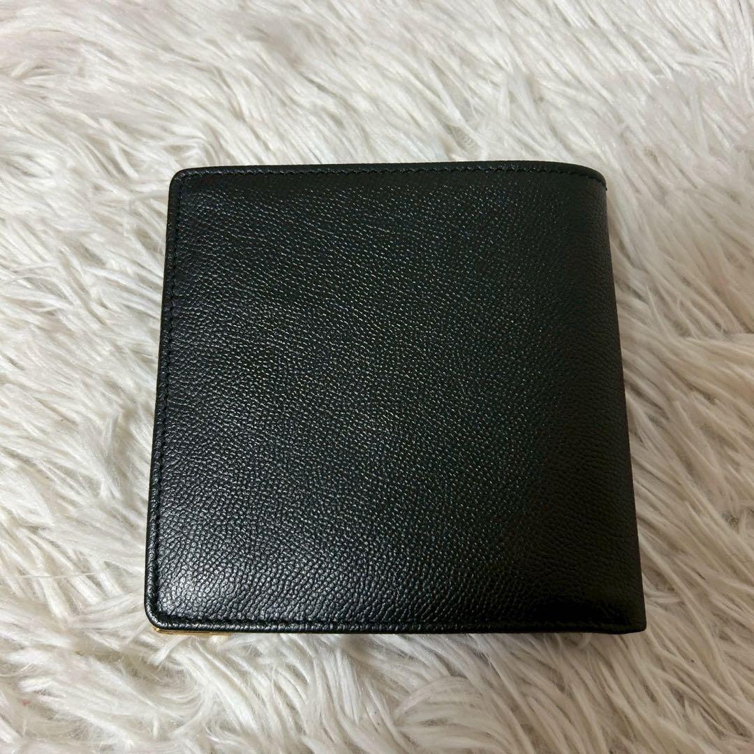 イヴサンローラン 二つ折り財布　ロゴ型押し ブラック