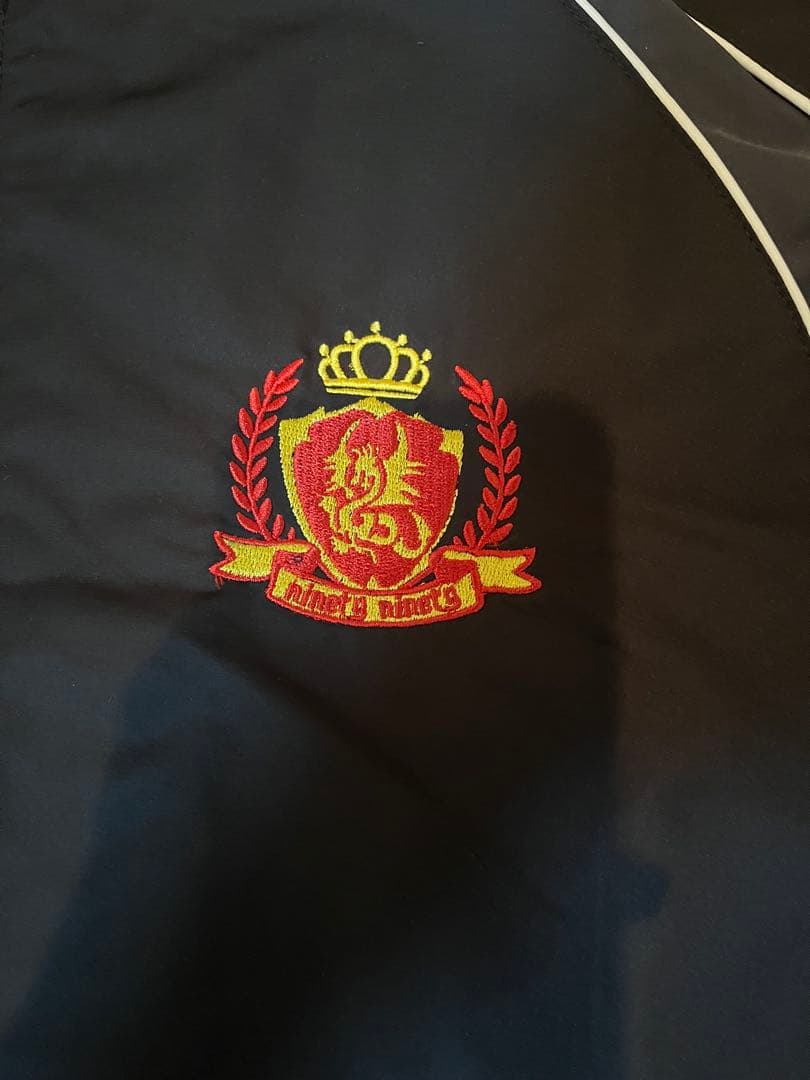 ジャケット・アウター 9090 x umbro Emblem Nylon Jacket black