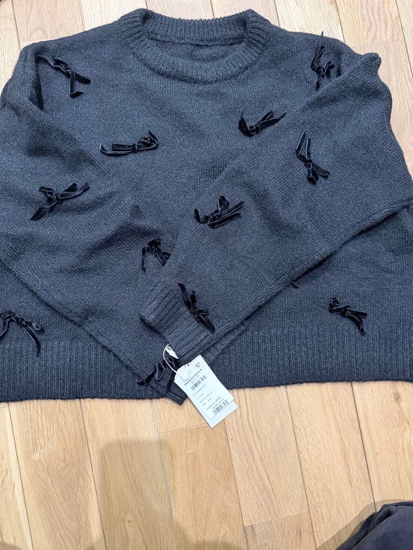 グレースコンチネンタル　リボンニットトップ