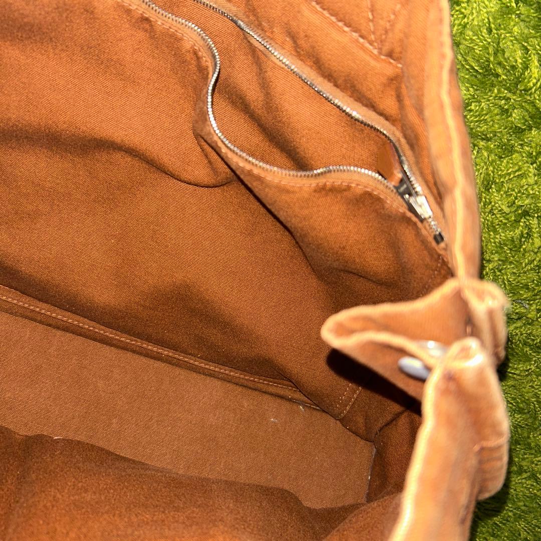 エルメスのブラウンレザーストライプトートバッグ