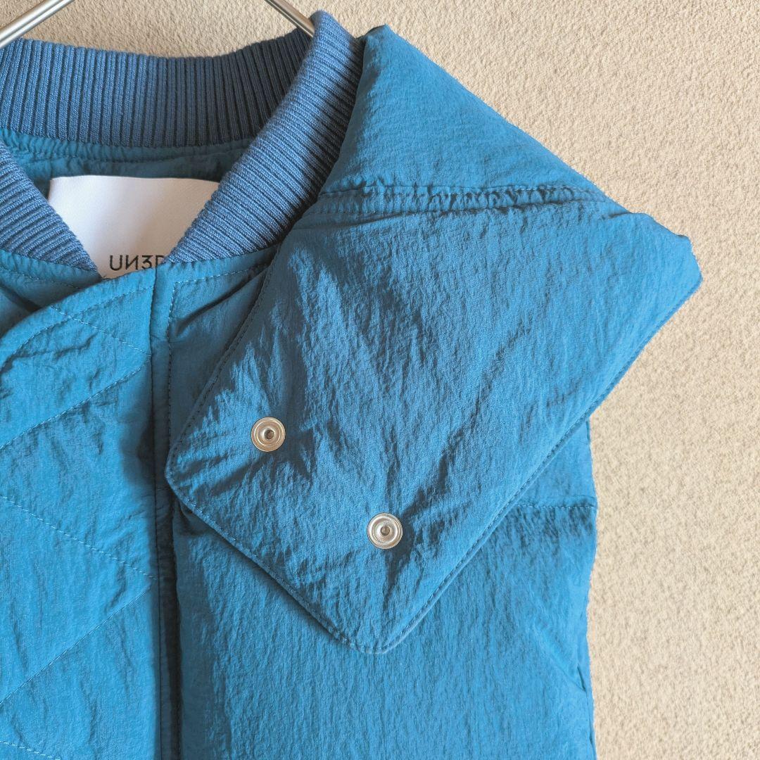 UN3D. ターコイズ 青 キルティングダウンベスト Wジッパー フード付