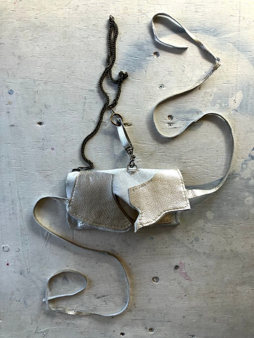 渋金革紐巻く二つ折りたたむネックウォレット＋zipperケース