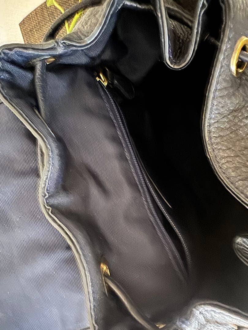 COACH本革ミニリュック