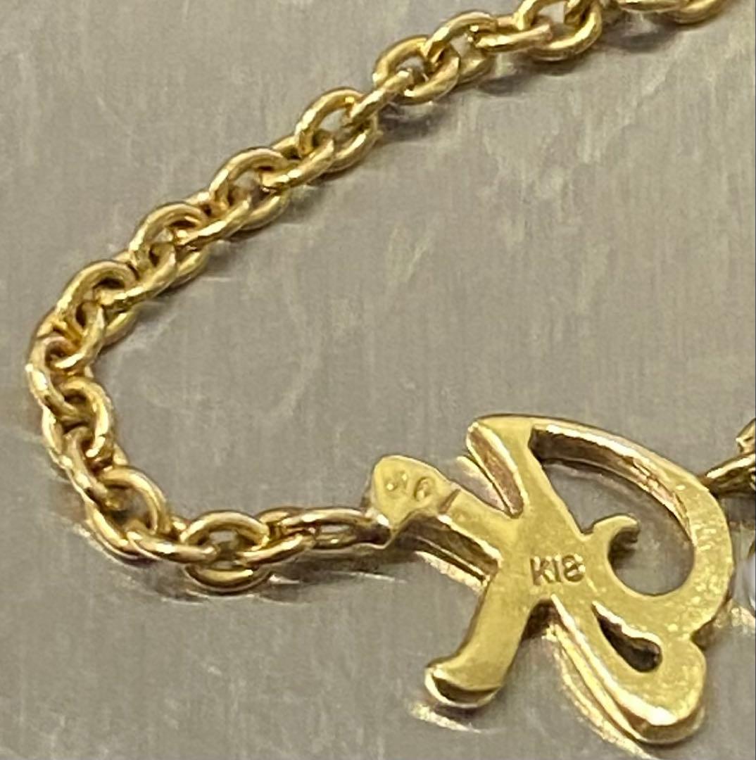 K18YGイニシャル（K）ダイヤチェーンリング　ダイヤ0.01ct 12-14号