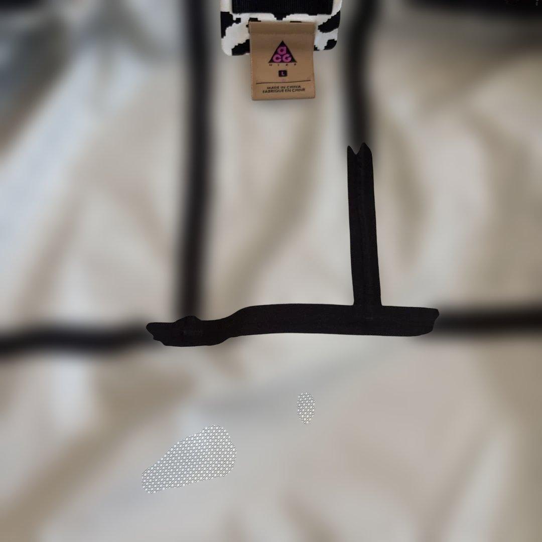 NIKE ACG : パッカブル レインジャケット 黒/白系 ゼブラ柄　Lサイズ