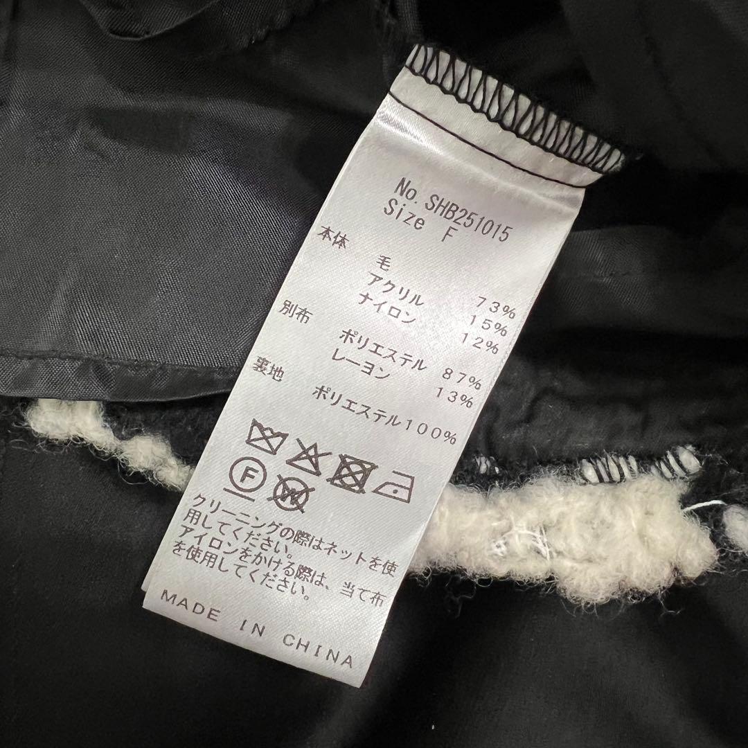 shellerシェリエ ギンガムツイードブルームトップス