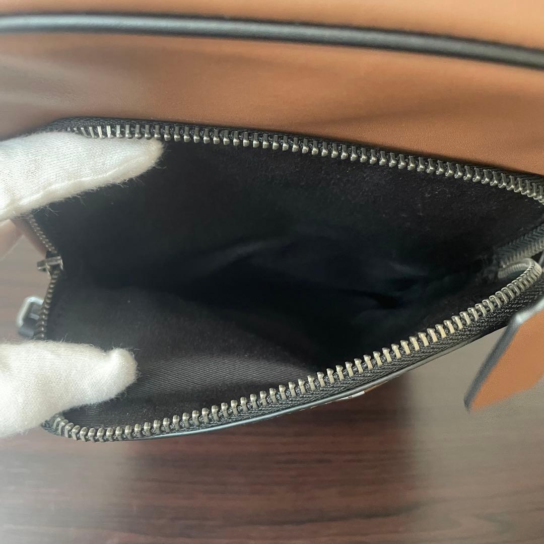 早い者勝ち！訳あり新品 COACH ボディバッグ サドル ブラウン×ブラック
