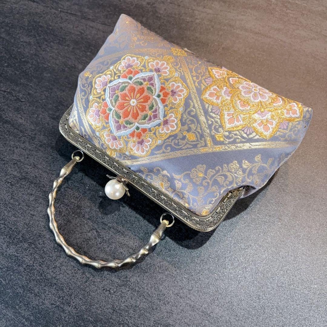 9月新作日本の奥ゆかしい伝統色源氏鼠色、、格の高い華紋柄の最高級西陣帯バッグ