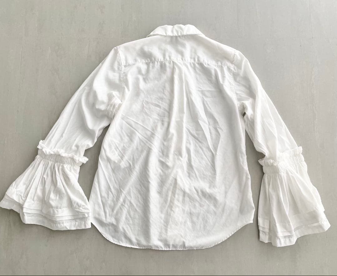 コムコム　フレアシャツ