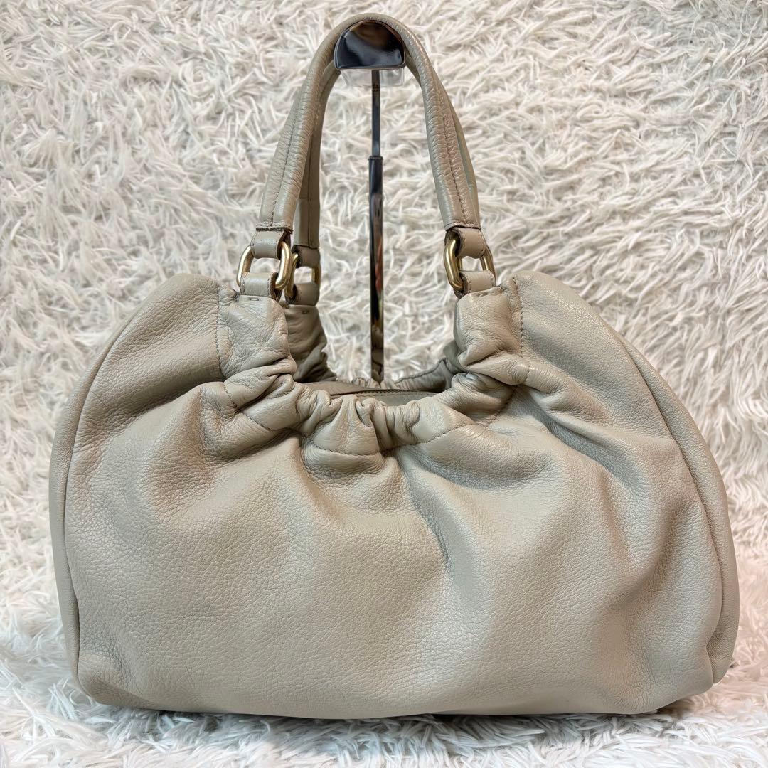 美品✨マックスマーラ ハンドバッグ 巾着 総柄 ロゴプレート ゴールド金具 本革